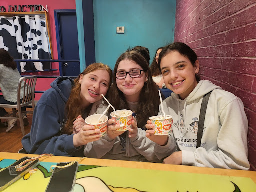 Group of people celebrating on stage