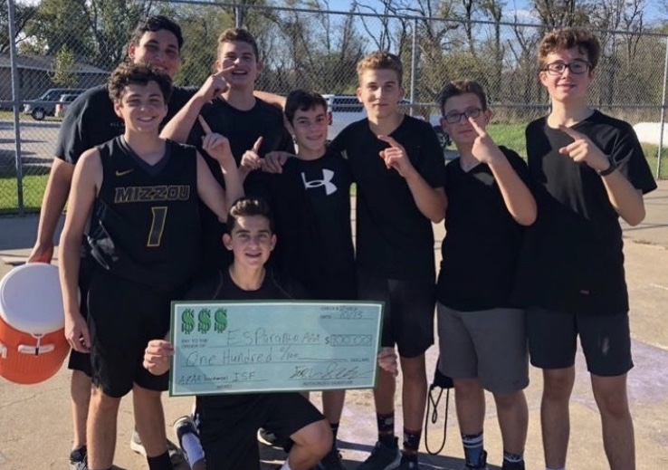 Group of people celebrating on stage