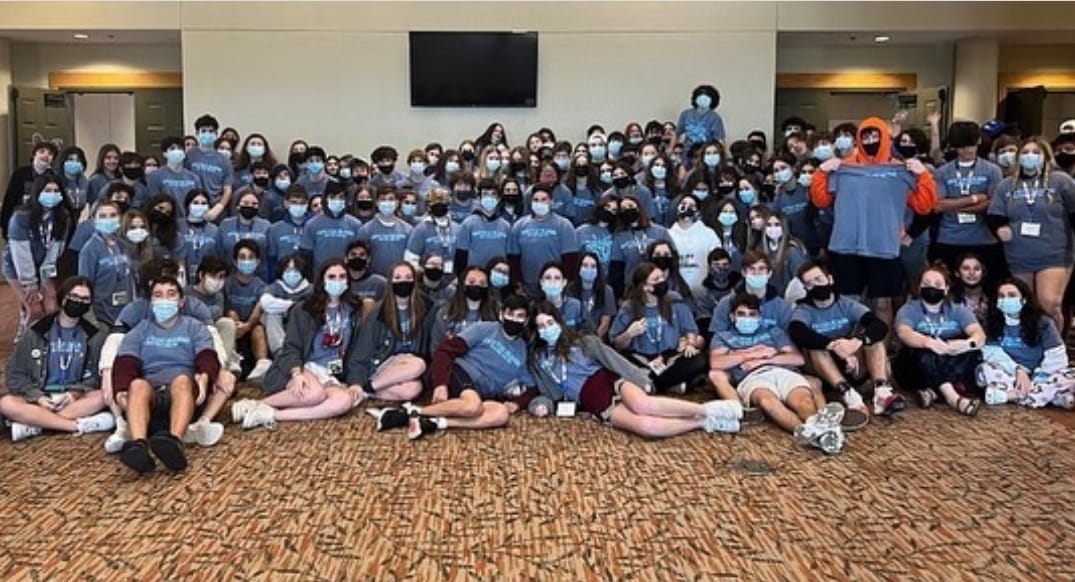 Group of people celebrating on stage