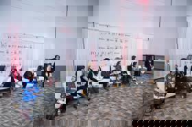 Group of people celebrating on stage