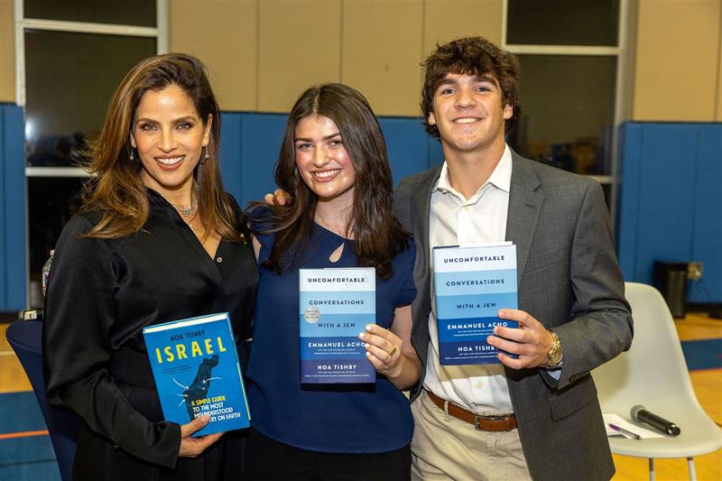 Group of people celebrating on stage