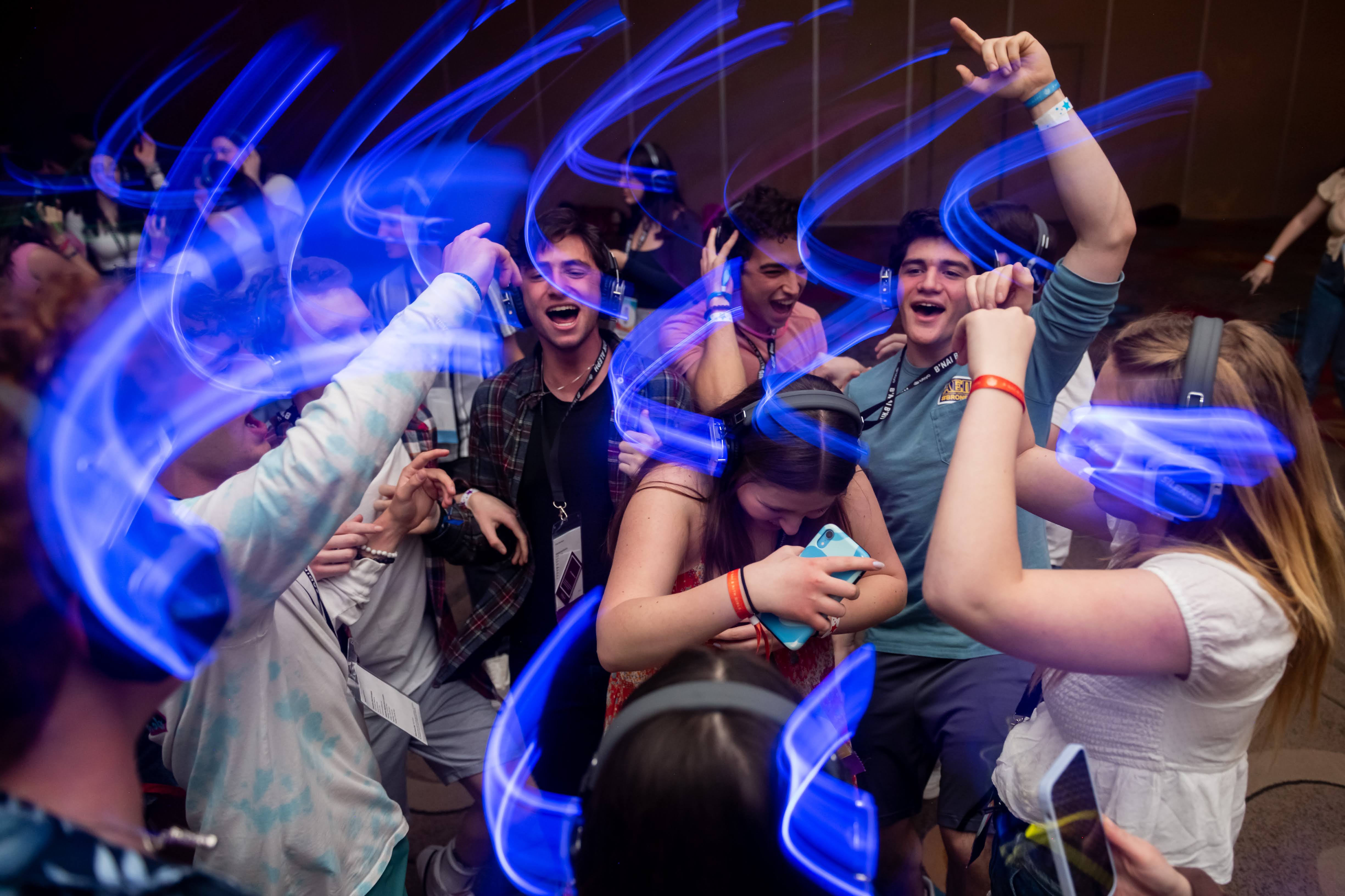 Group of people celebrating on stage