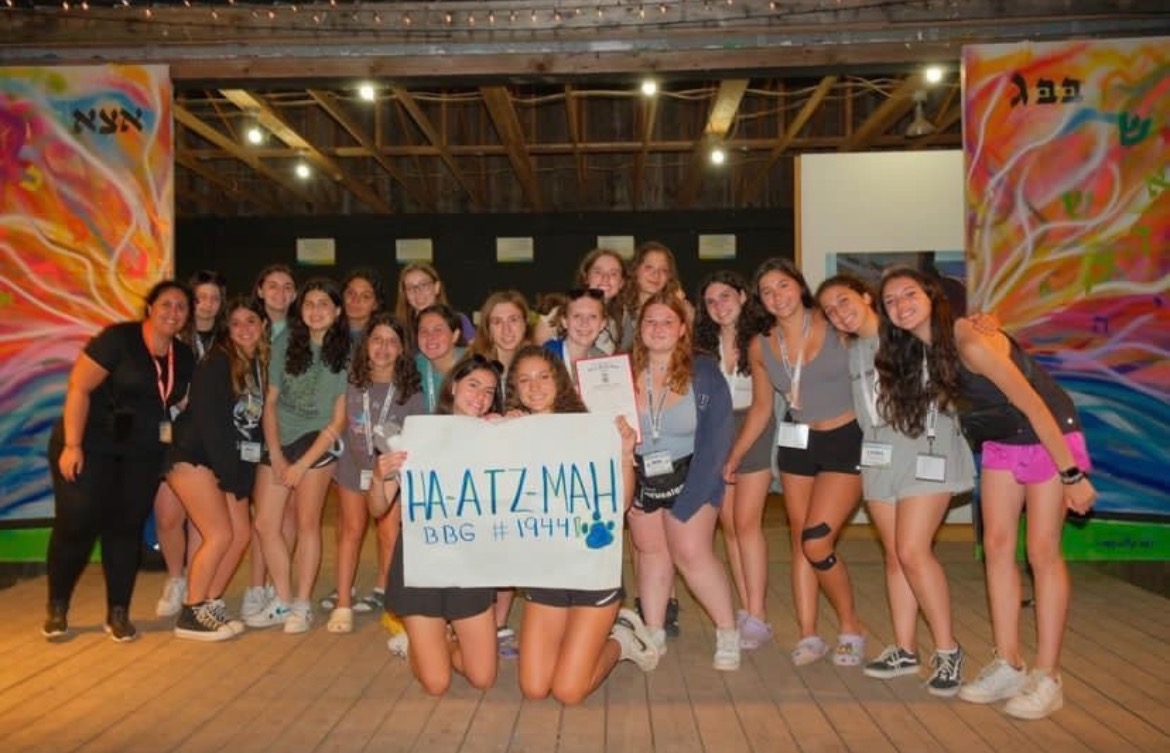 Group of people celebrating on stage