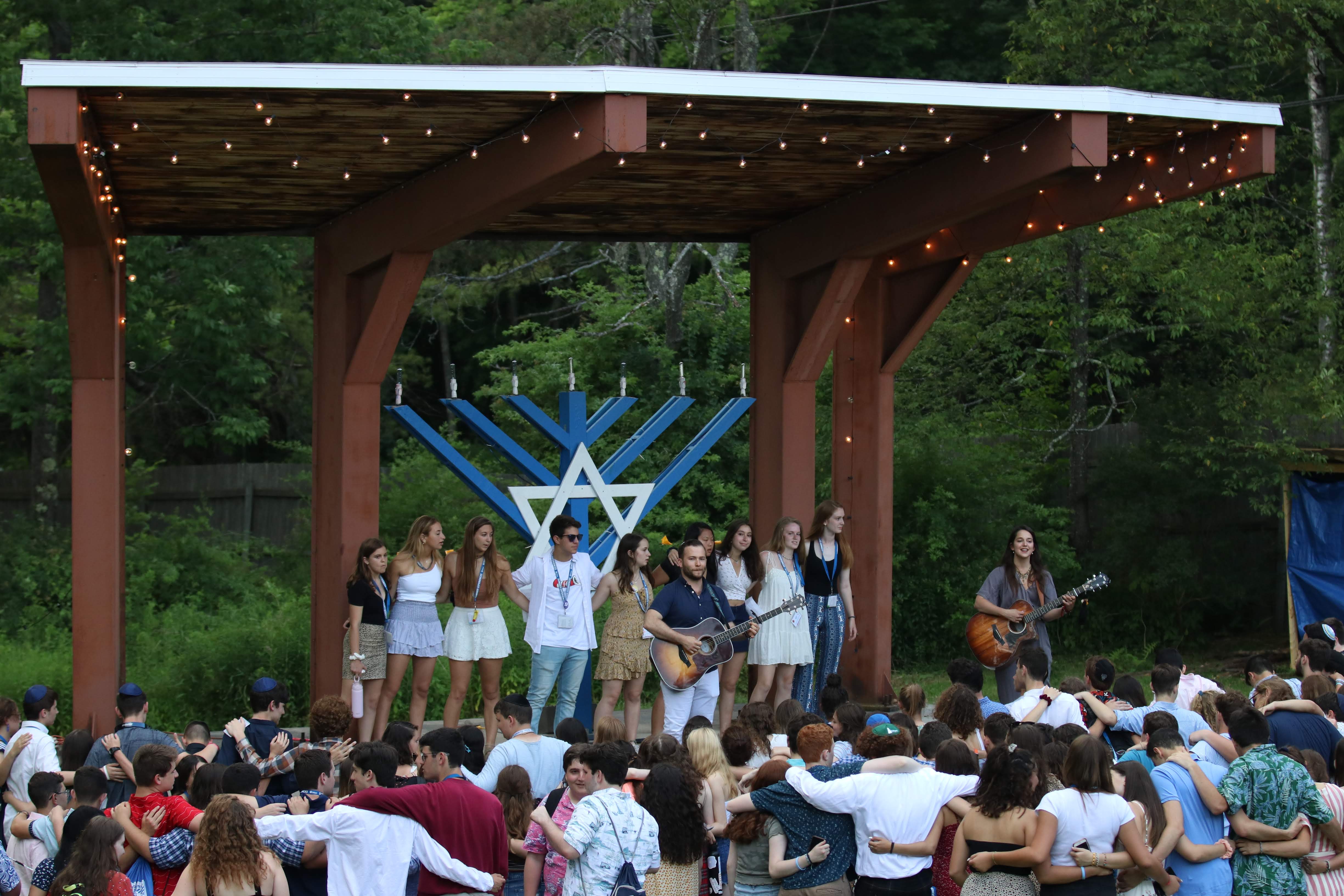 Group of people celebrating on stage