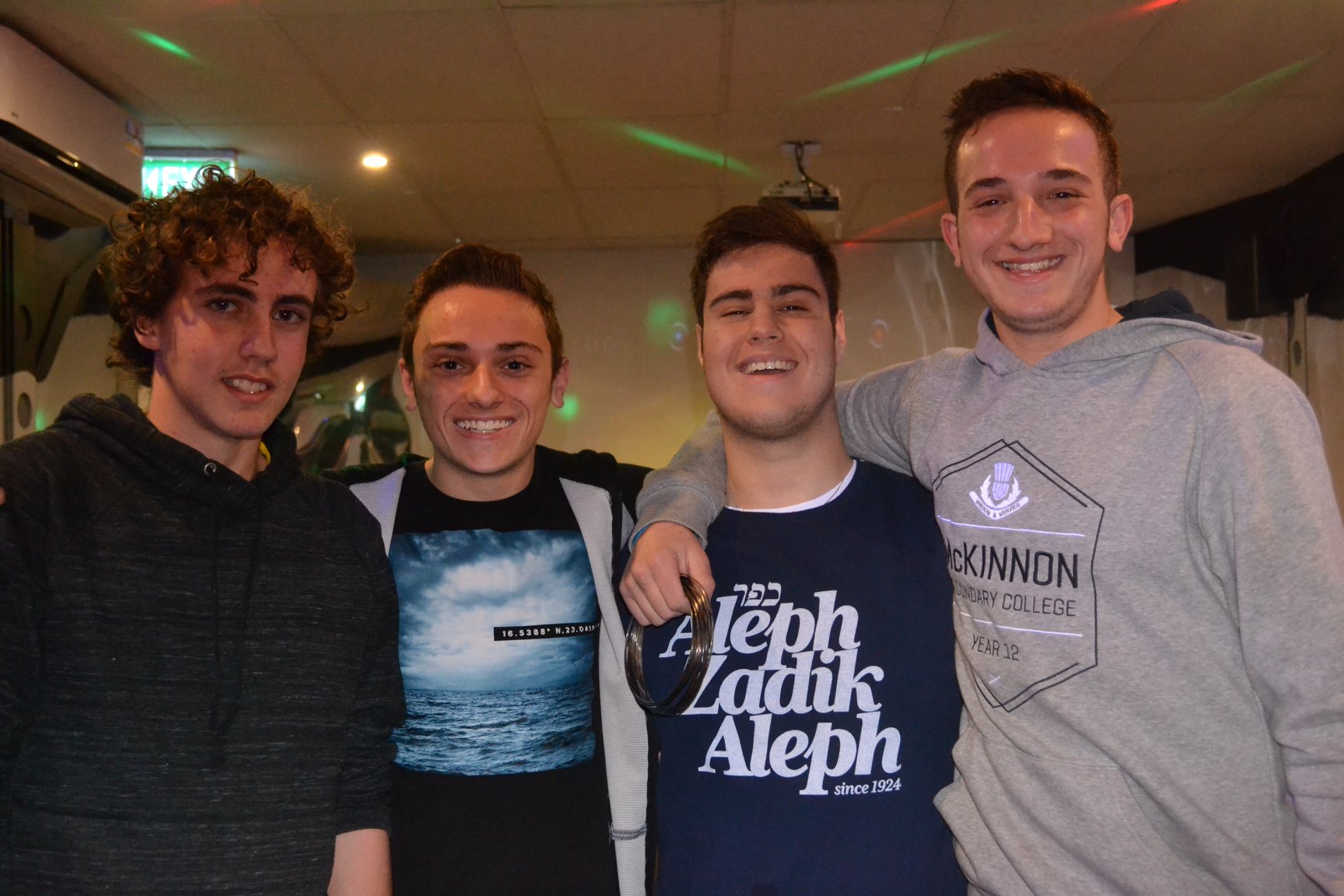 Group of people celebrating on stage