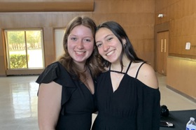 Group of people celebrating on stage