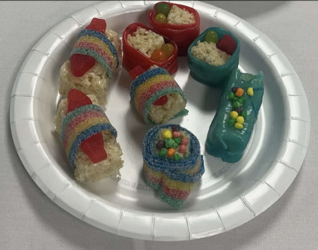 Group of people celebrating on stage