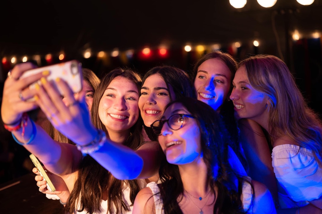 Group of people celebrating on stage