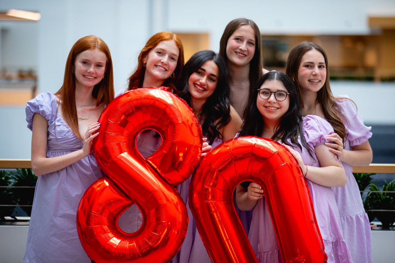 Group of people celebrating on stage