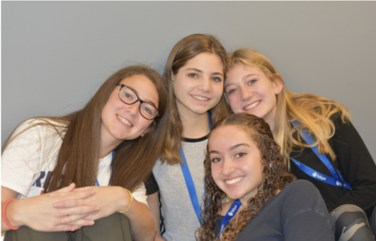 Group of people celebrating on stage