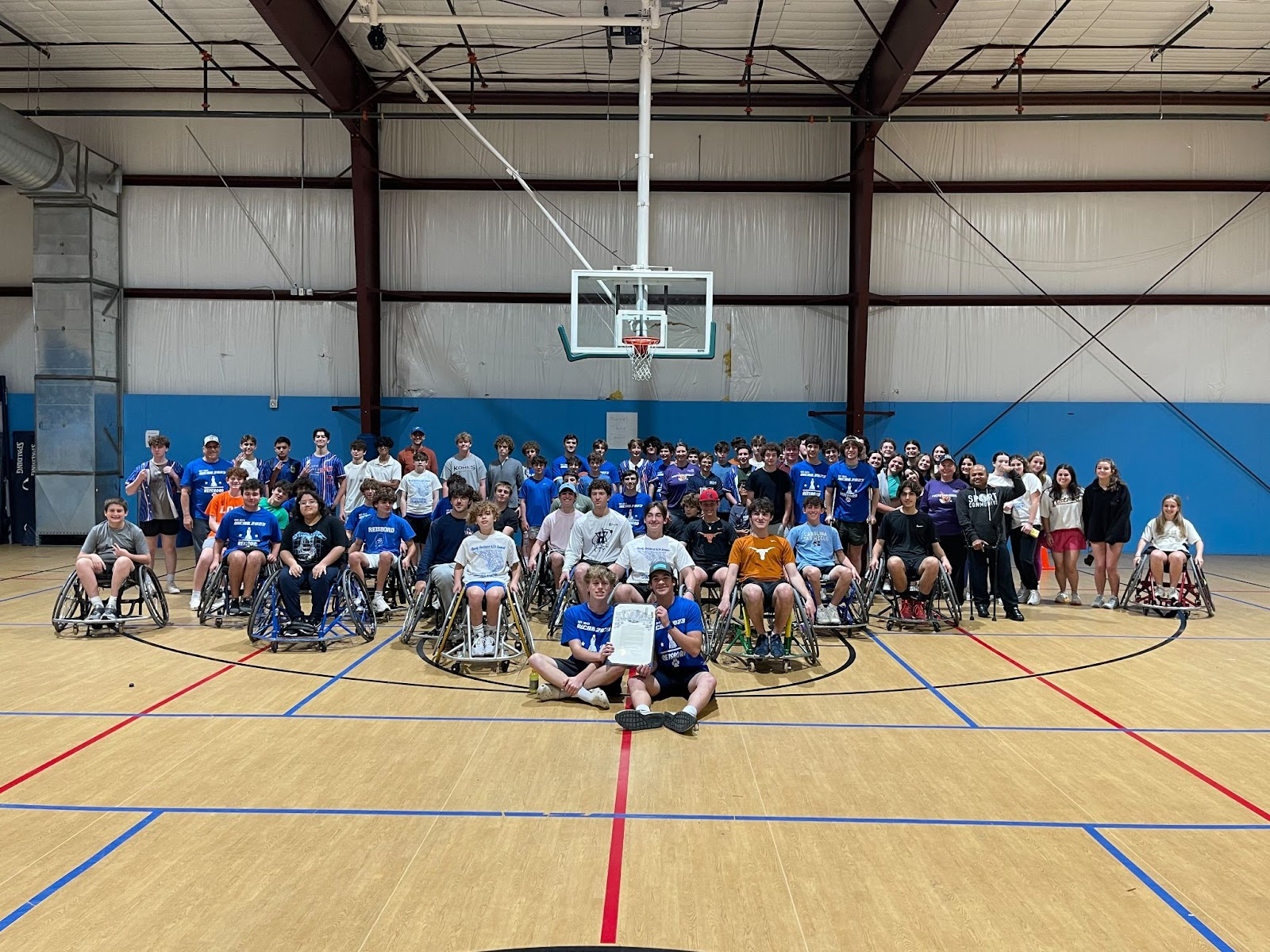 Group of people celebrating on stage