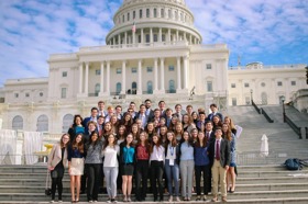 Group of people celebrating on stage
