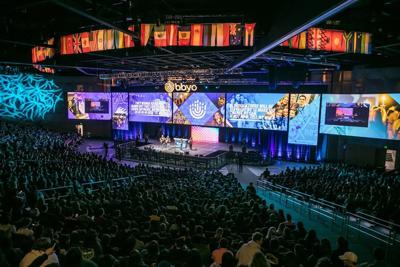 Group of people celebrating on stage