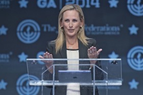 Group of people celebrating on stage