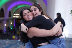 Group of people celebrating on stage