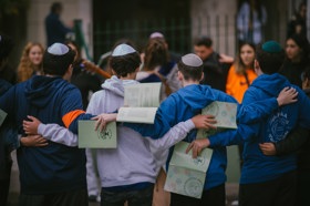 Group of people celebrating on stage