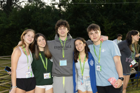 Group of people celebrating on stage