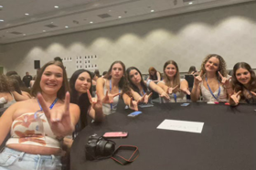 Group of people celebrating on stage