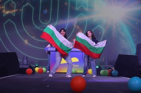 Group of people celebrating on stage