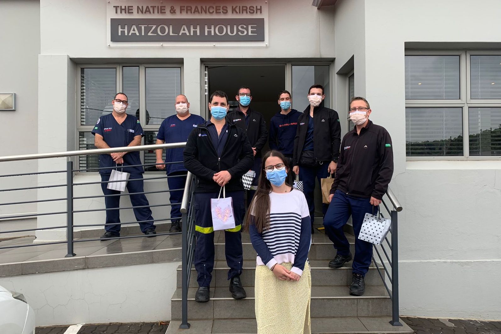 Group of people celebrating on stage