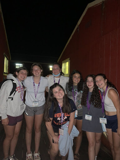 Group of people celebrating on stage