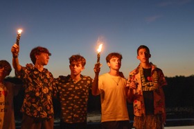 Group of people celebrating on stage