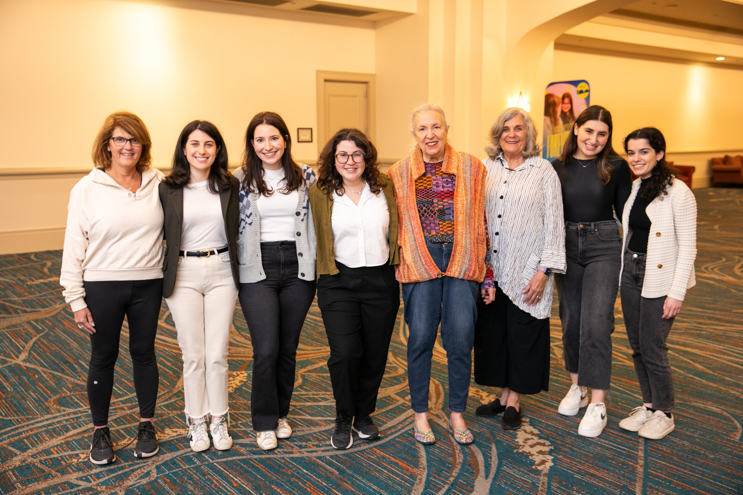 Group of people celebrating on stage