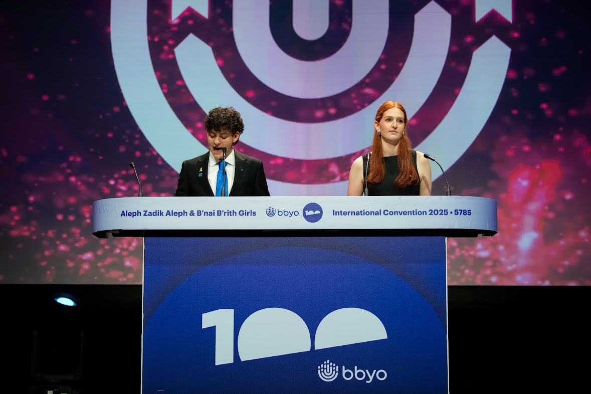 Group of people celebrating on stage