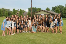 Group of people celebrating on stage