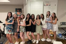 Group of people celebrating on stage