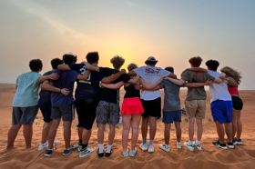 Group of people celebrating on stage