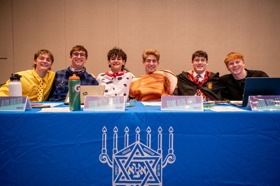 Group of people celebrating on stage