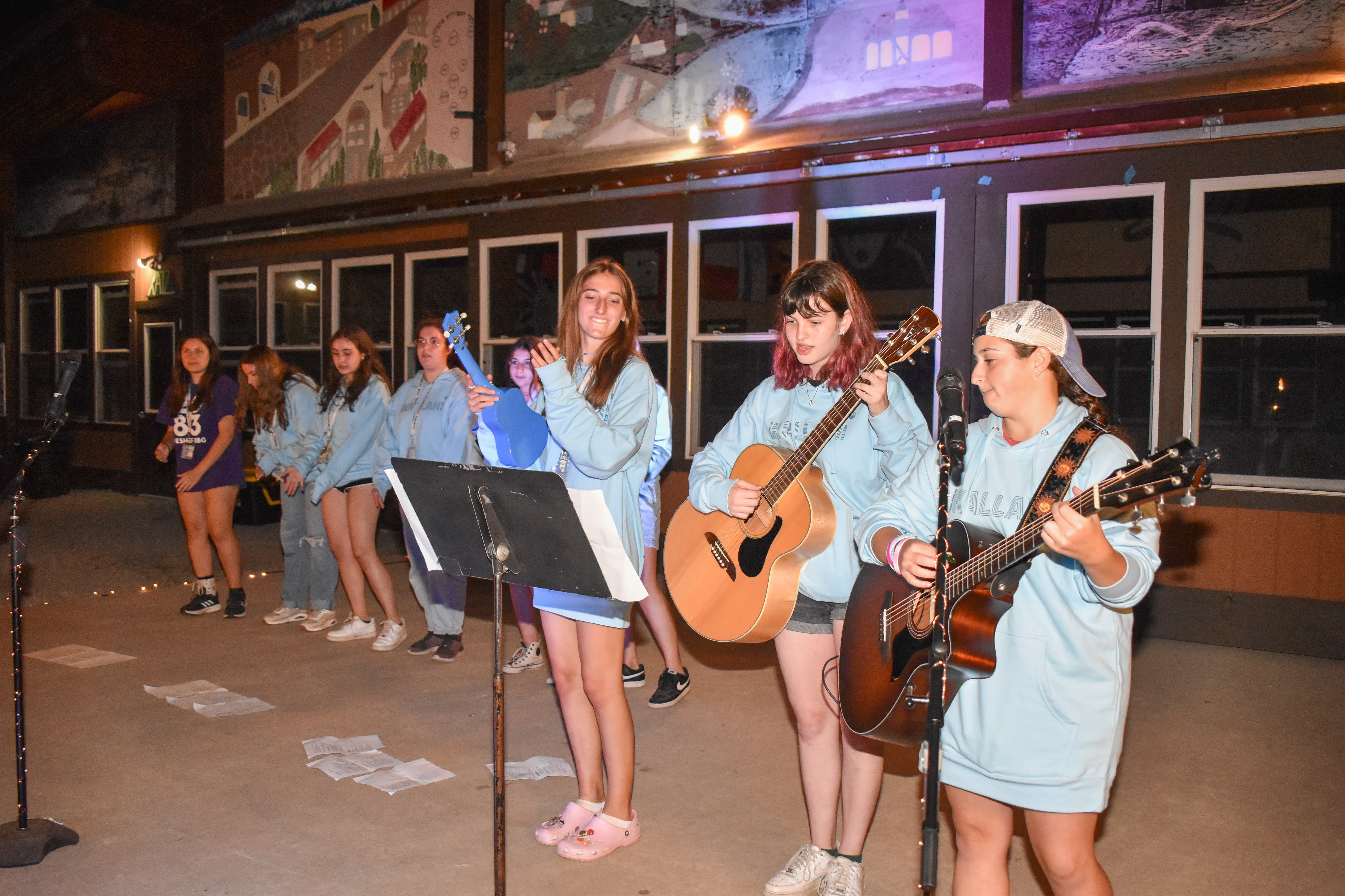 Group of people celebrating on stage