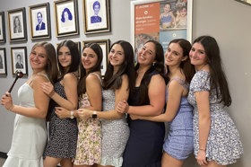 Group of people celebrating on stage