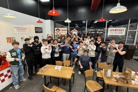 Group of people celebrating on stage