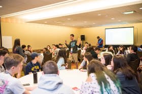 Group of people celebrating on stage