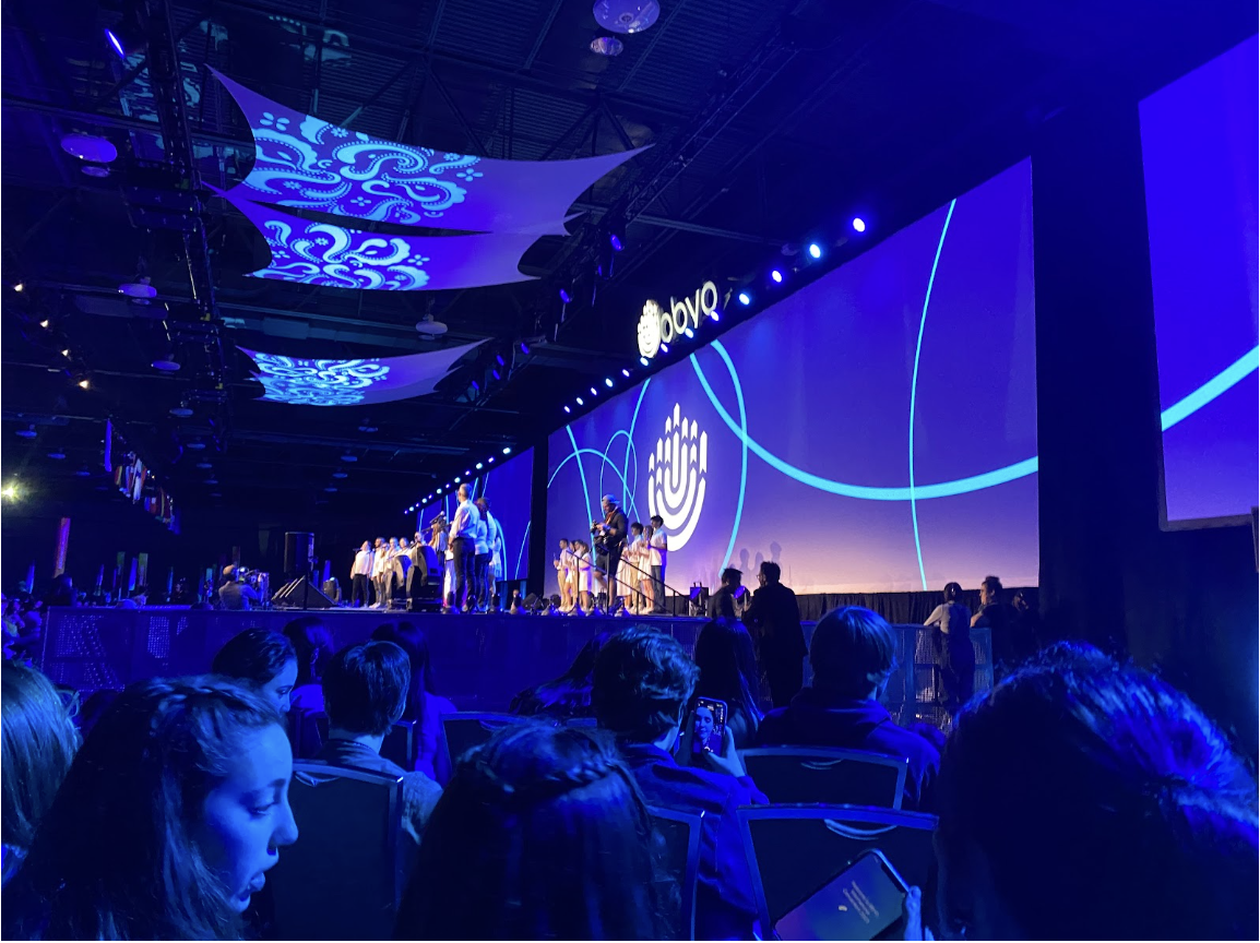 Group of people celebrating on stage