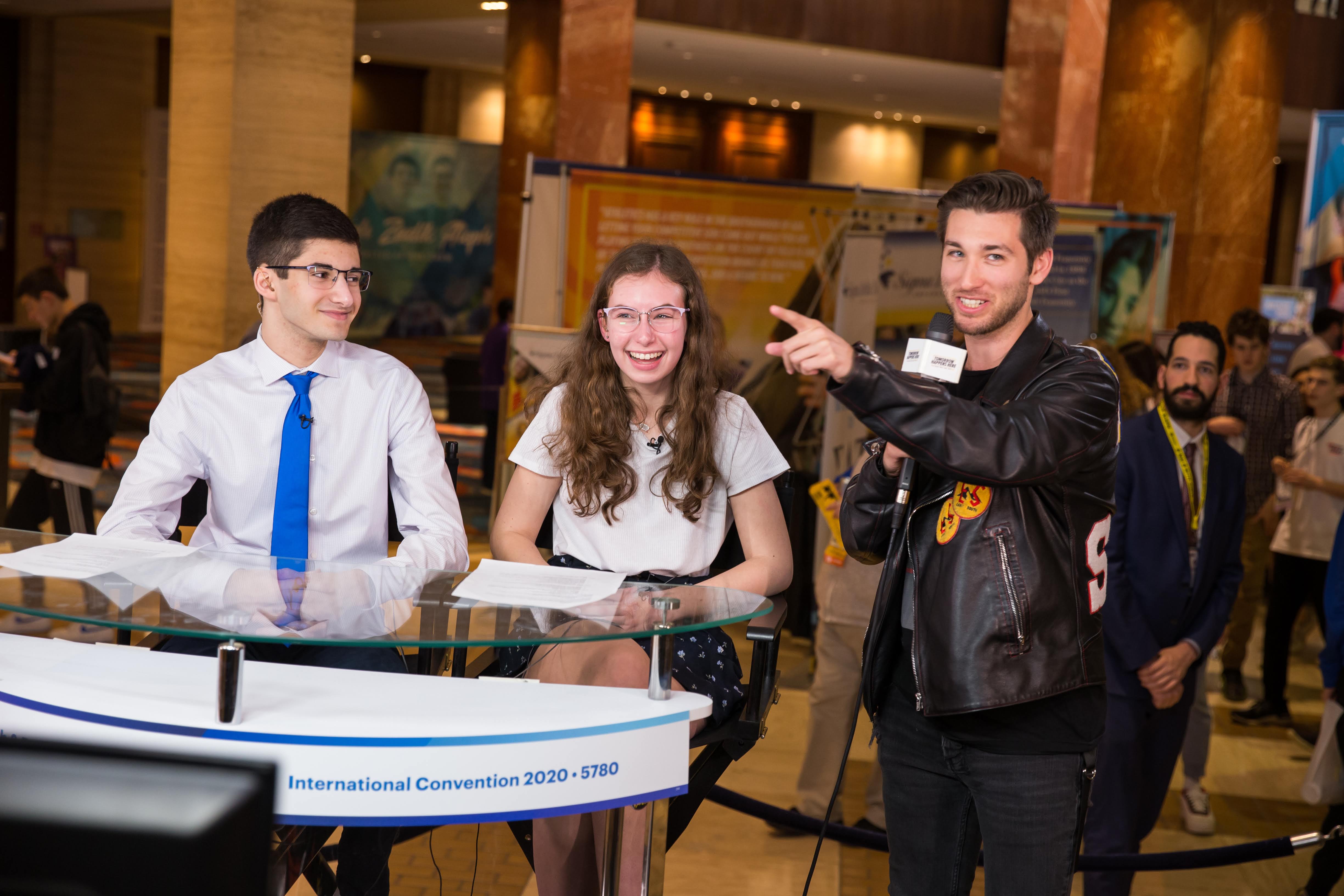 Group of people celebrating on stage