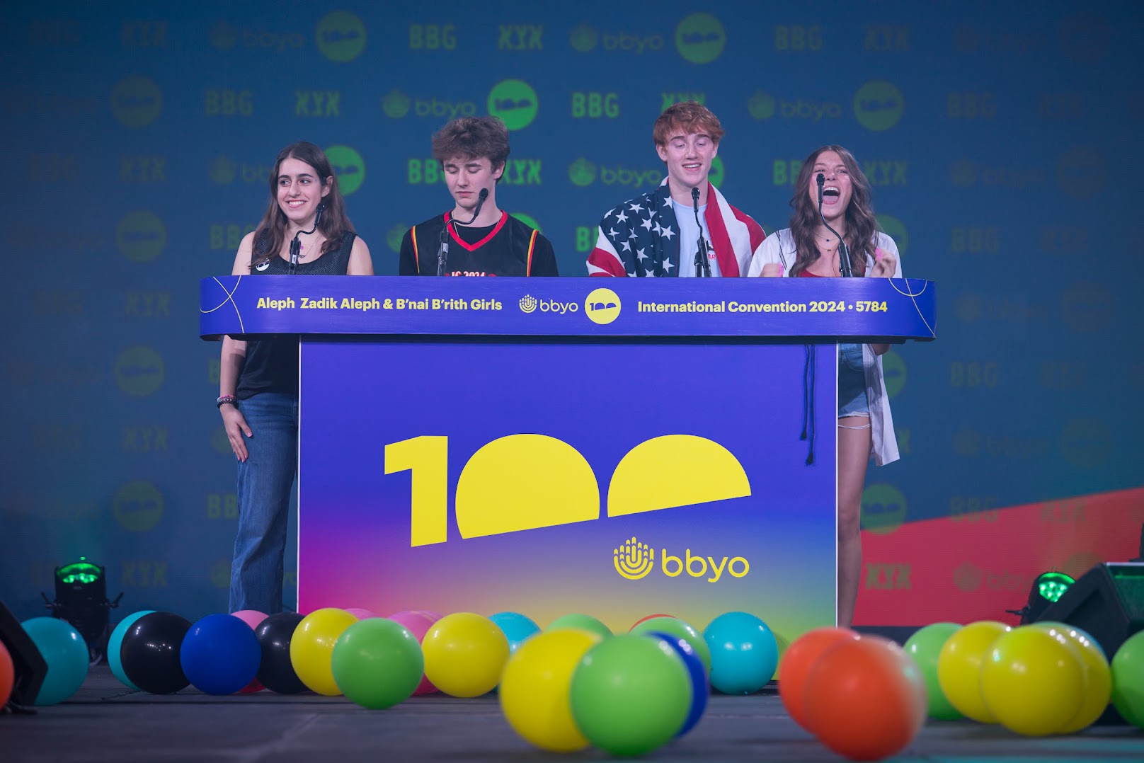 Three friends sitting on a hammock