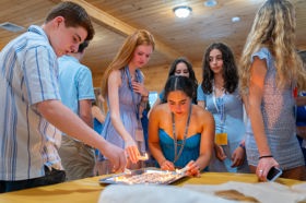 Group of people celebrating on stage