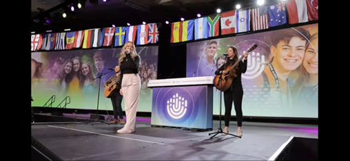 Group of people celebrating on stage