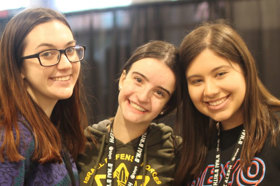 Group of people celebrating on stage