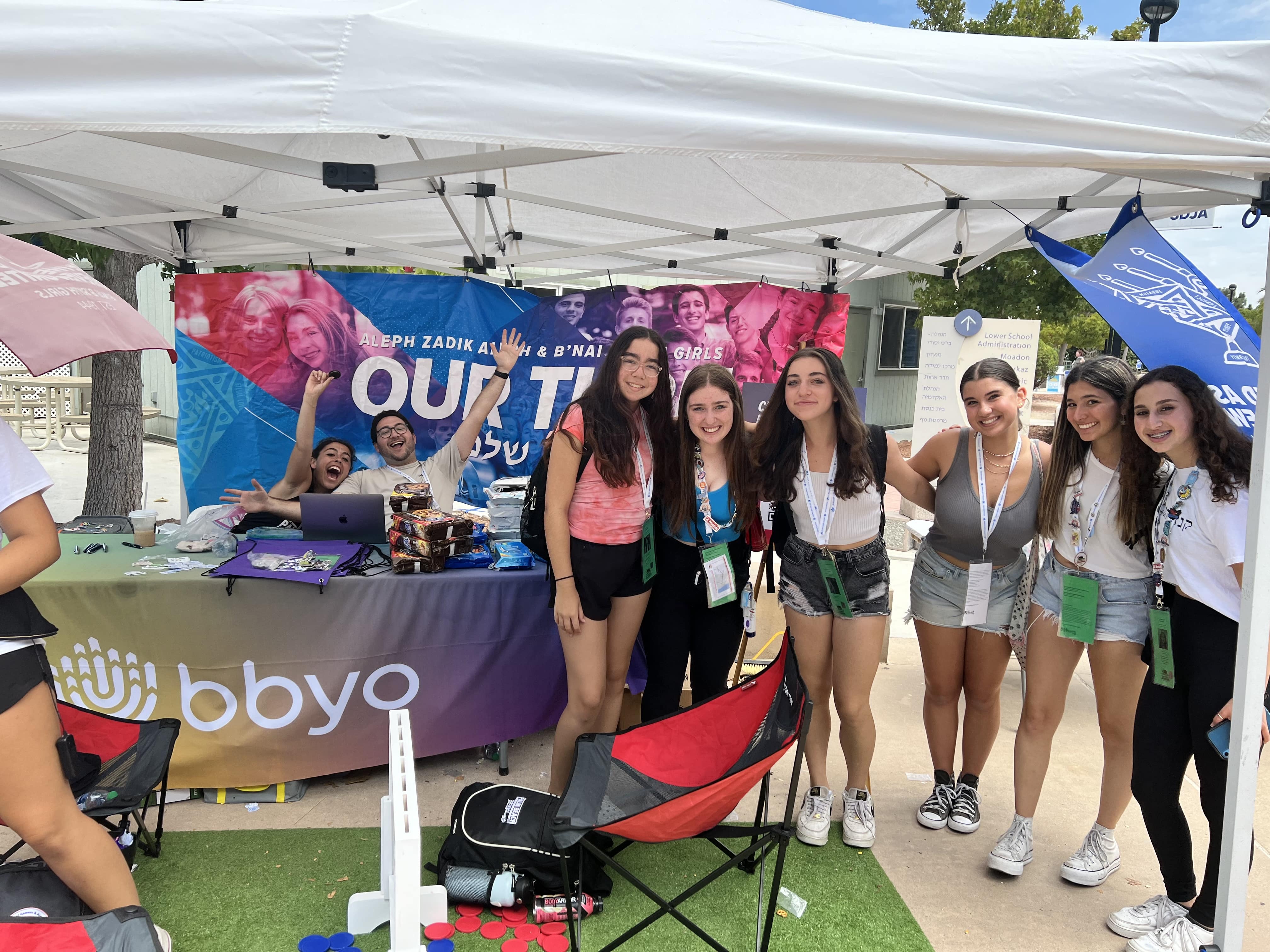 Group of people celebrating on stage