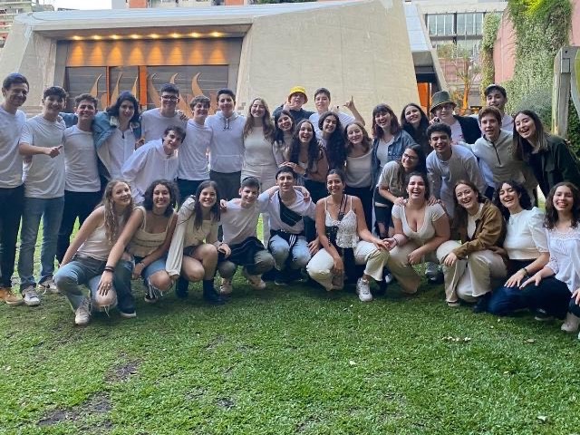 Group of people celebrating on stage