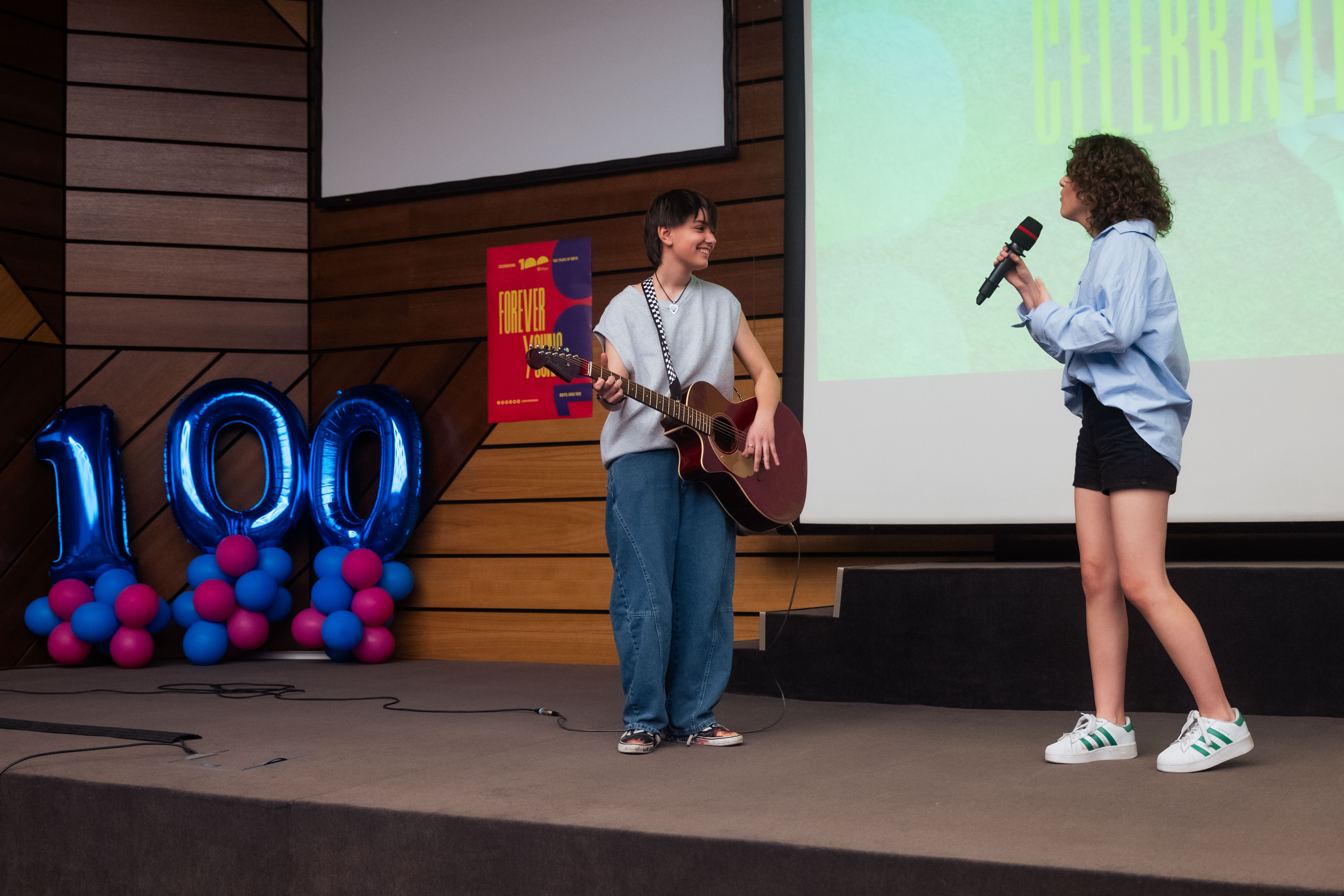 Group of people celebrating on stage
