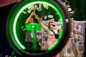 Group of people celebrating on stage