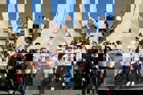 Group of people celebrating on stage