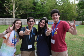 Group of people celebrating on stage