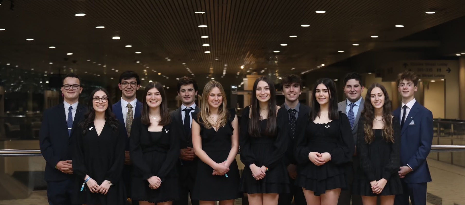 Group of people celebrating on stage