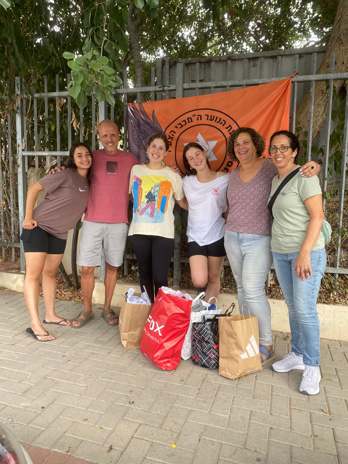 Group of people celebrating on stage